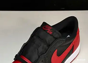 705329-001 Low Jordan Bred Retro 1 0430